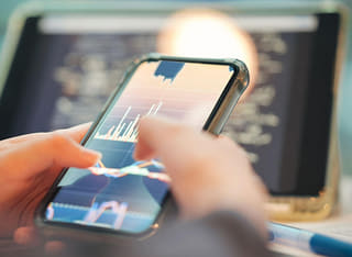 Individual reviewing the clear withdrawal and money transfer procedure