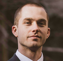 Portrait of Thomas Whitfield, a crypto market analyst and trading expert